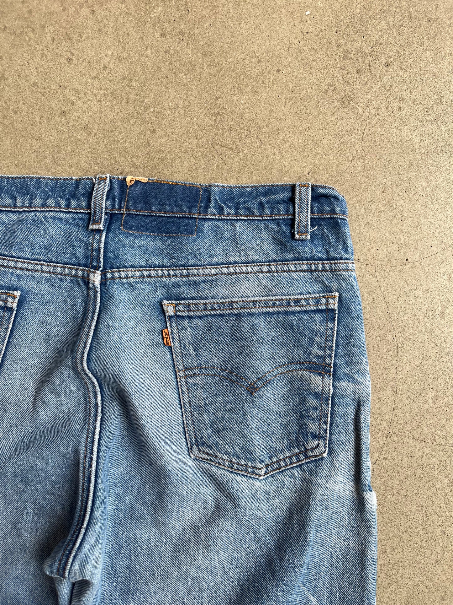 Levi's Distressed Orange Tab Jeans