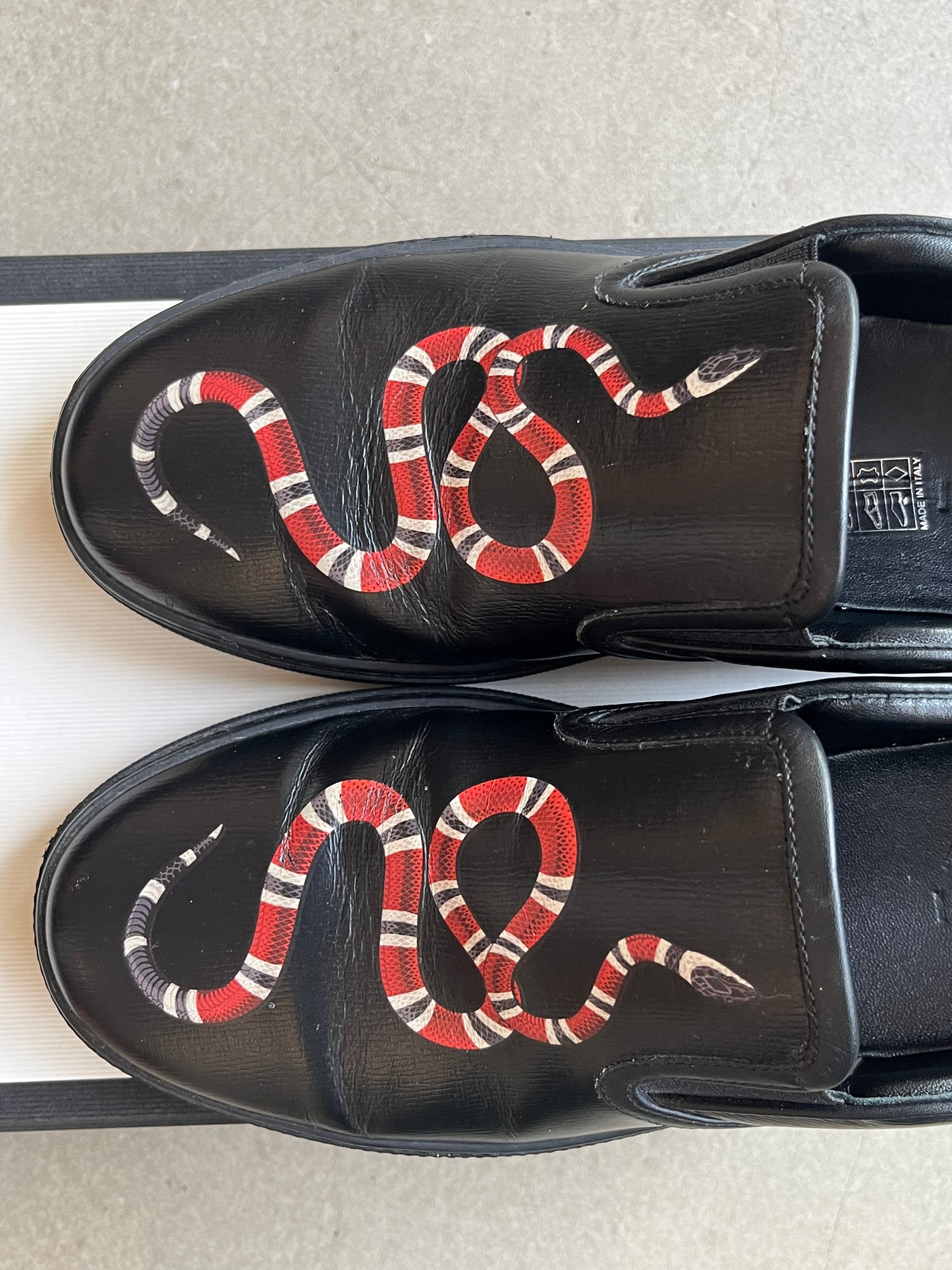 Gucci Leather Snake Print Slip-ons Black