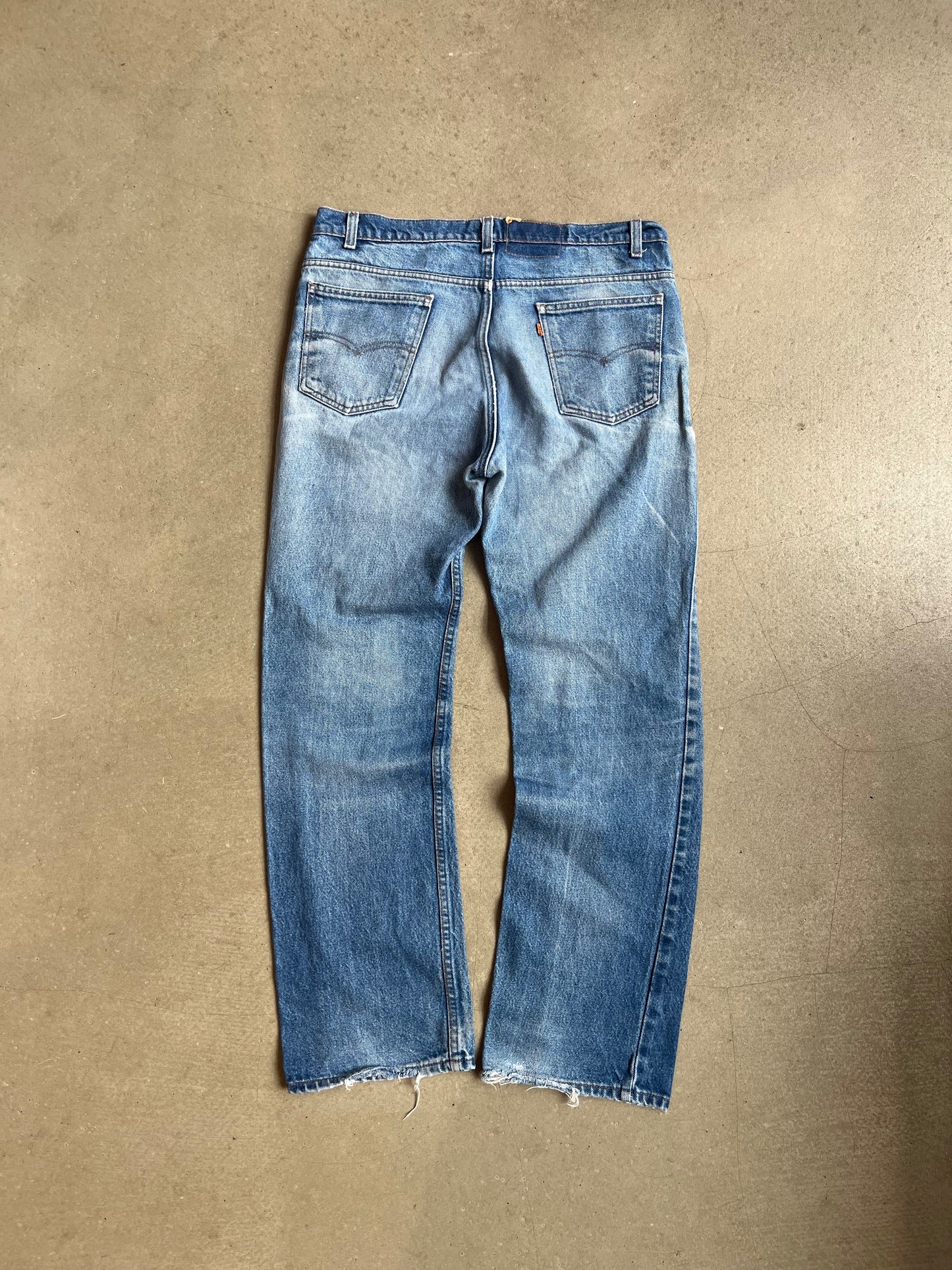 Levi's Distressed Orange Tab Jeans