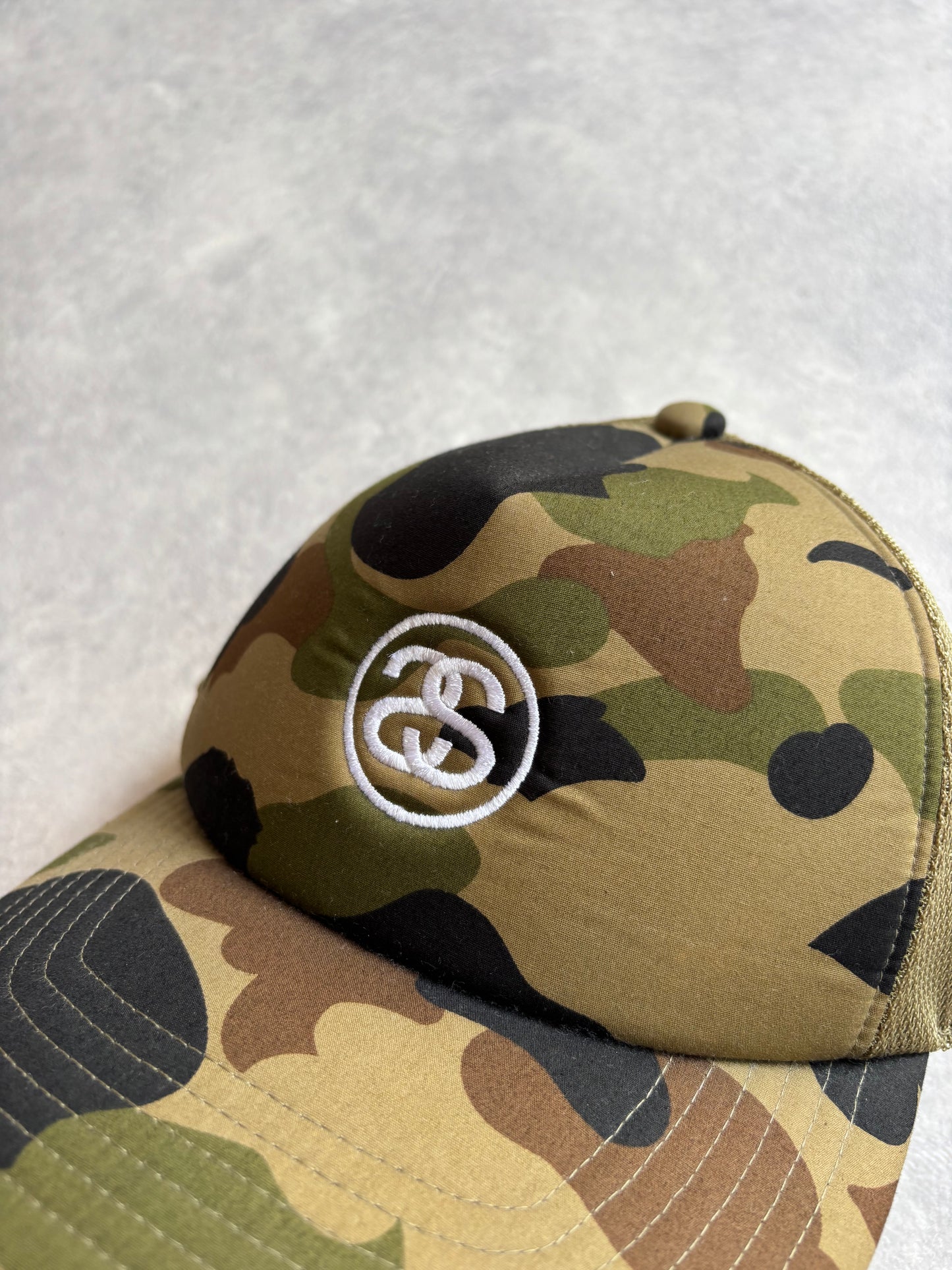 A Bathing Ape x Stussy Hats Camo Cap