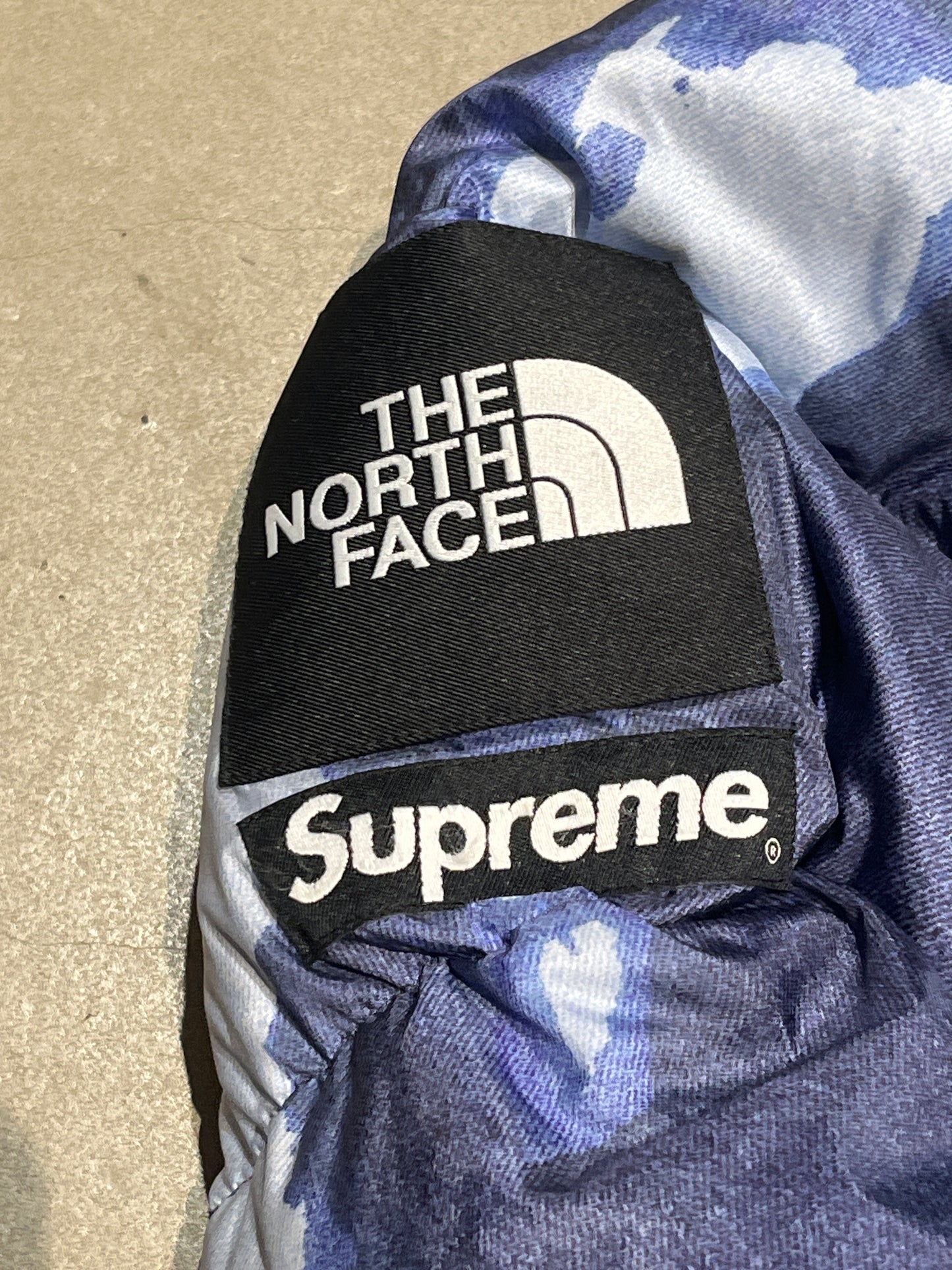 Supreme The North Face Bleached Denim Print Nuptse Jacket Indigo M