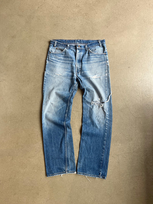 Levi's Distressed Orange Tab Jeans