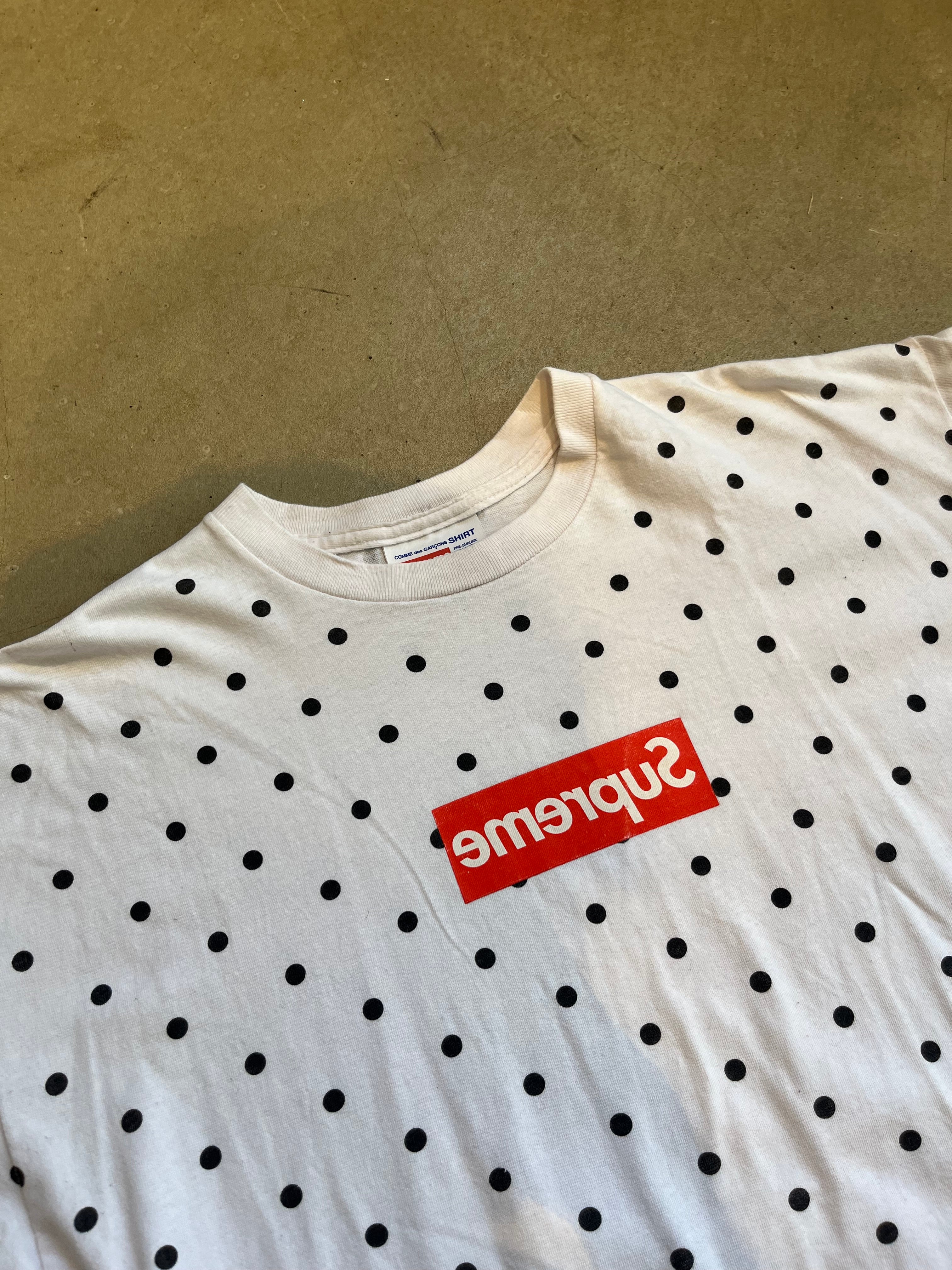 Cdg x supreme retailers bogo