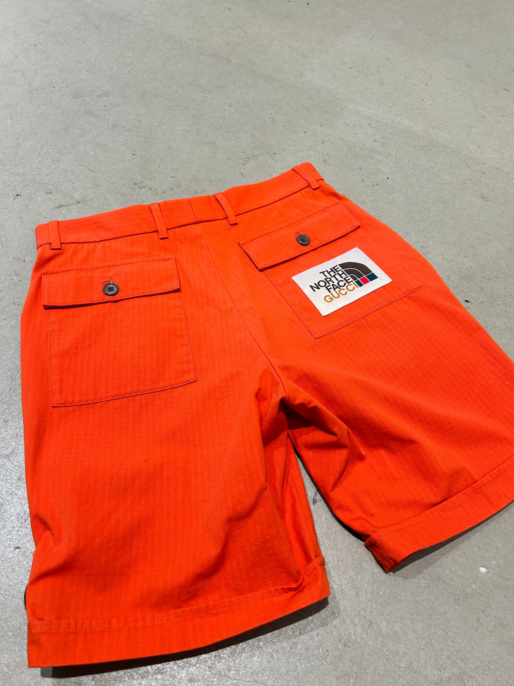 Orange gucci shorts sales